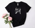 BE STILL T-SHIRT